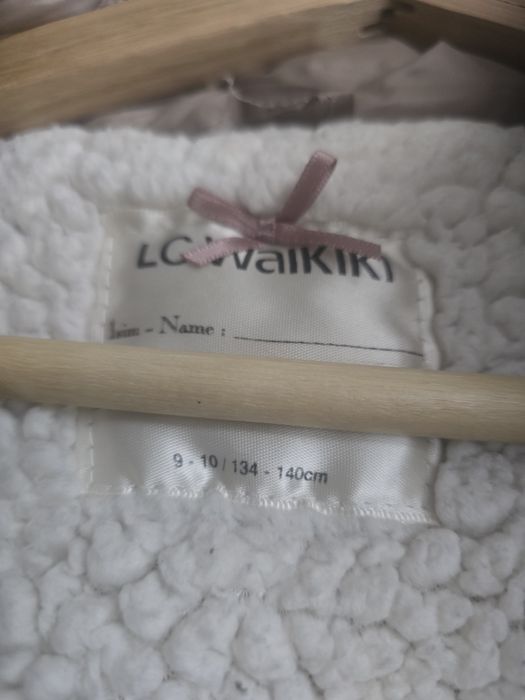 Куртка тепла на дівчинку 134-140