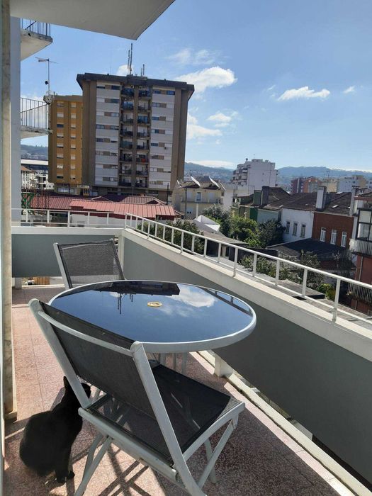 Quarto com varanda em Coimbra