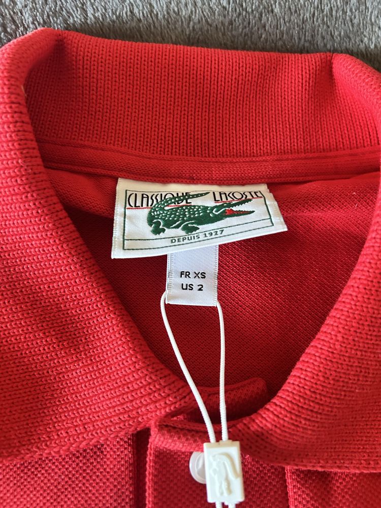 Червоне Поло Lacoste