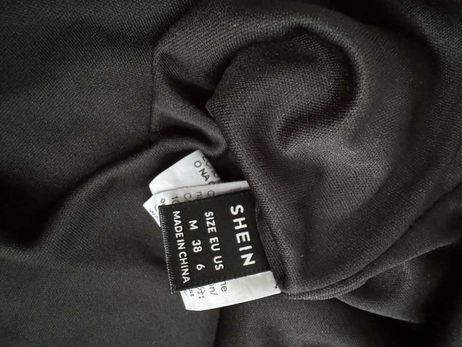 Чорна міні спідниця жіноча з паєтками