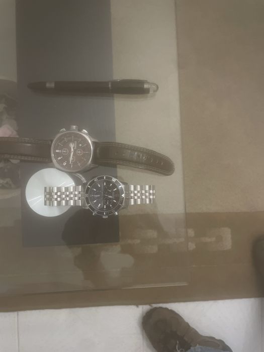 Dois relogios um tissot e Timberland, uma caneta prmanente mont blanc