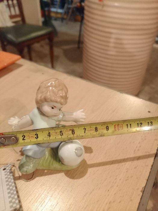 Boneco de porcelana feito á mão