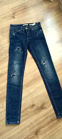 Spodnie jeansowe Reserved xs 34