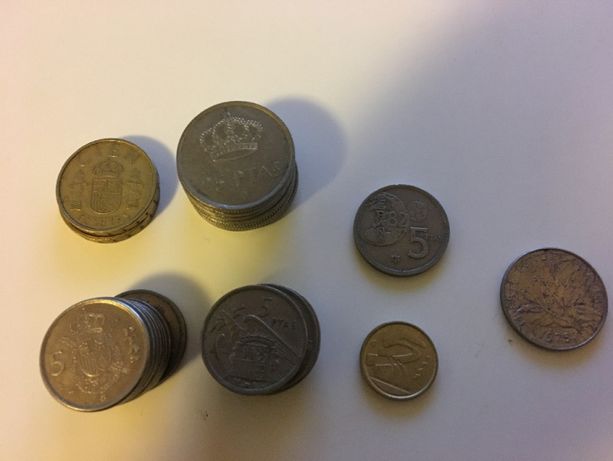 Varias Moedas de Pesetas e uma moeda de 1 franco