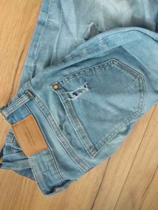 Spodnie damskie jeans Bershka S 36 dziury