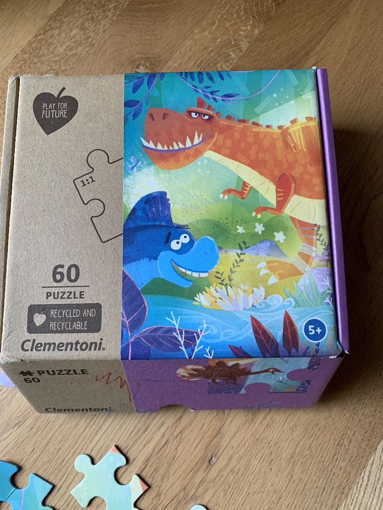 Puzzle 60 elementow Dinozaury Wesołe miasteczko Super wings Clementoni