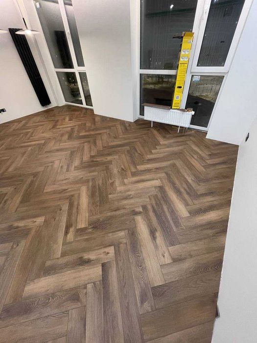 Укладка  кварцвініл ламінат spc Вирівнювання підлоги