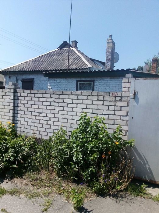 Продам половину будинка в районі Першої міської лікарні