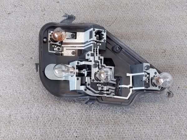 Suporte lâmpada esquerdo OPEL Astra H Hatchback (L48)