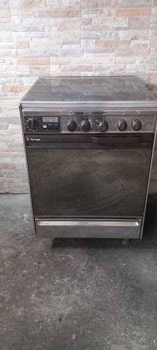 fogao a gas canalizado com quatro bicos e forno inox