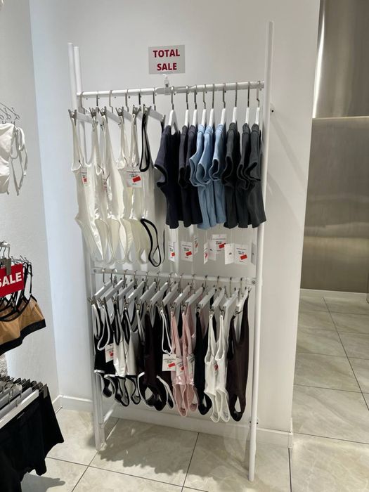 Рейли для одягу білі настінні