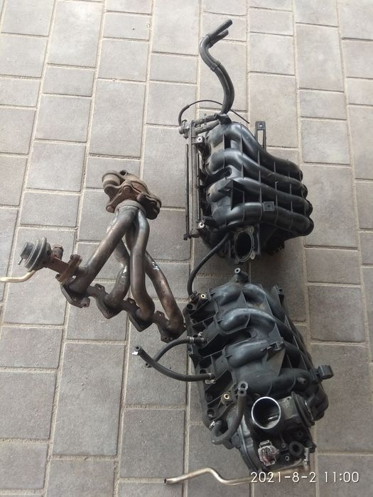 Колектор впускний випускний Volkswagen Bora Skoda Golf 4 Гольф 4 Fabia