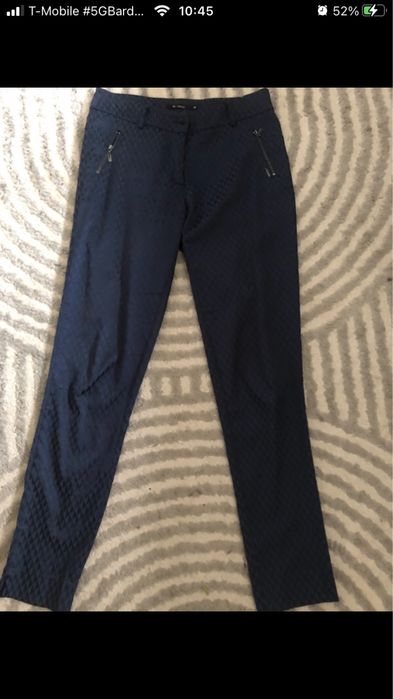 Spodnie z zameczkami Monnari