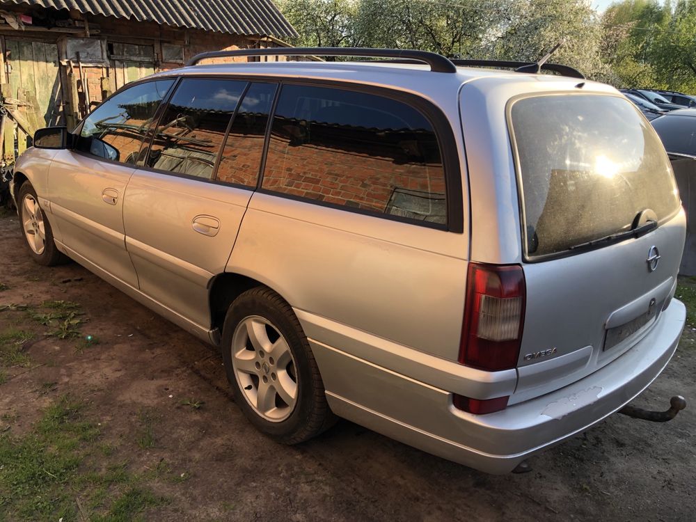 Разборка Opel Omega B бампер капот дверь фары двигатель салон ляда гбц