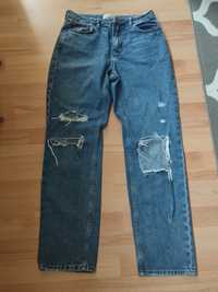 Modne jeansy jesienne ripped mom jeans  z przetarciami dziurami