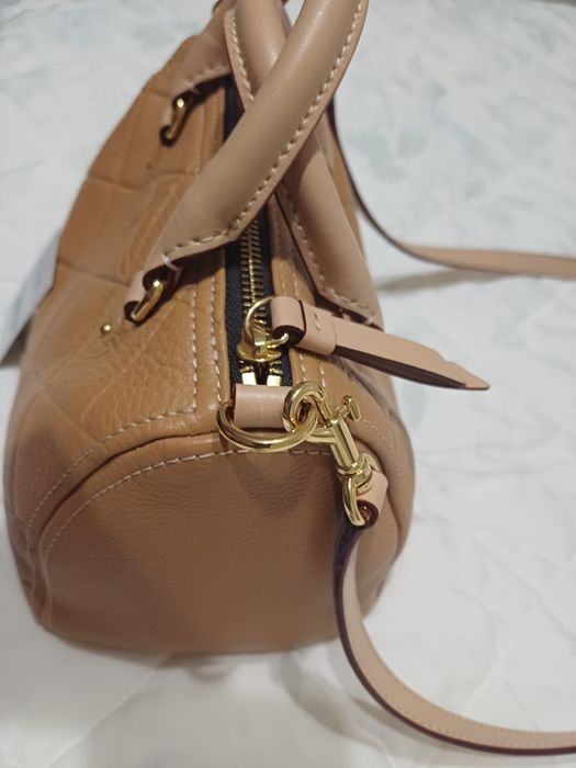 Mala, carteira nova Purificación García