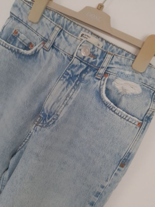 Spodnie dżinsowe z rozdarciami