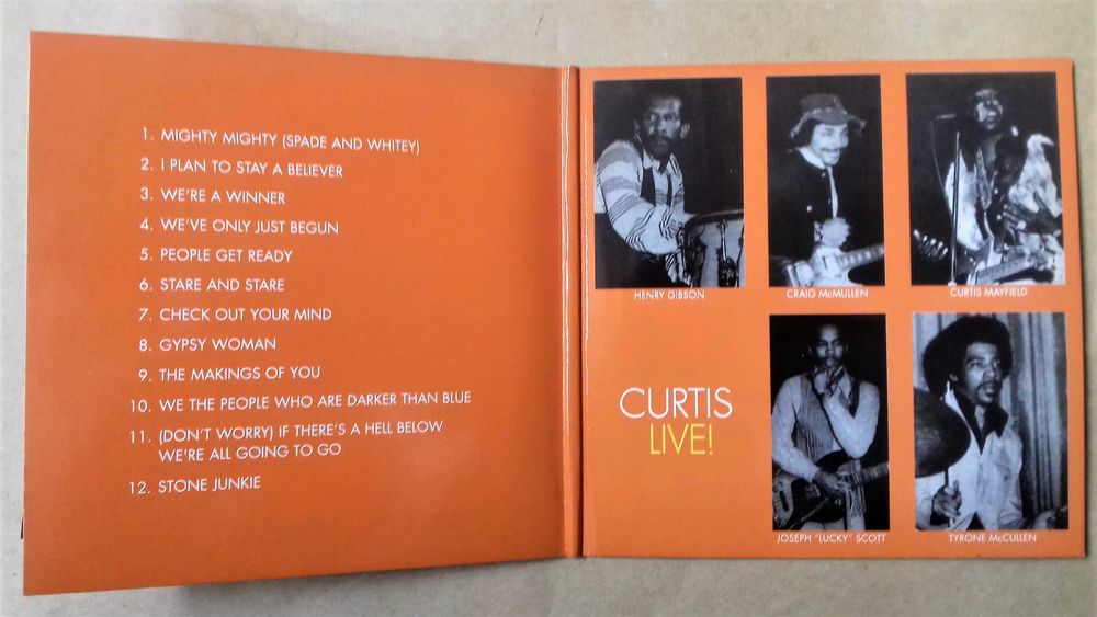 Cd de Curtis Mayfield e 1 DVD do Roy Orbinson.