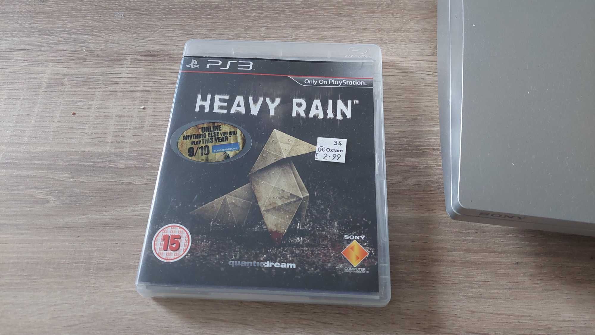 Srebrne PlayStation 3 + gra Heavy Rain, 2 pady, kable HDMI i zasilania