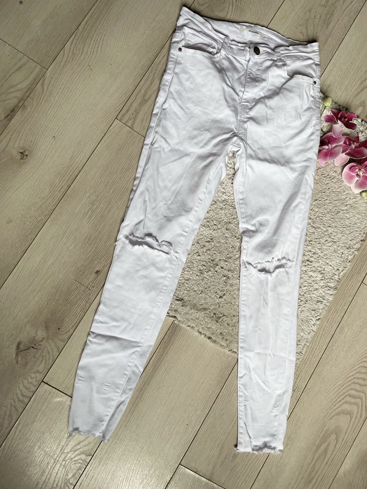 Białe skinny rurki damskie z dziurami rozmiar M
