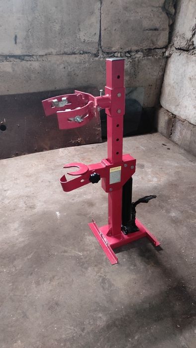 Гідравлічний зйомник пружин.Стенд для розбирання автомобільних стійок.