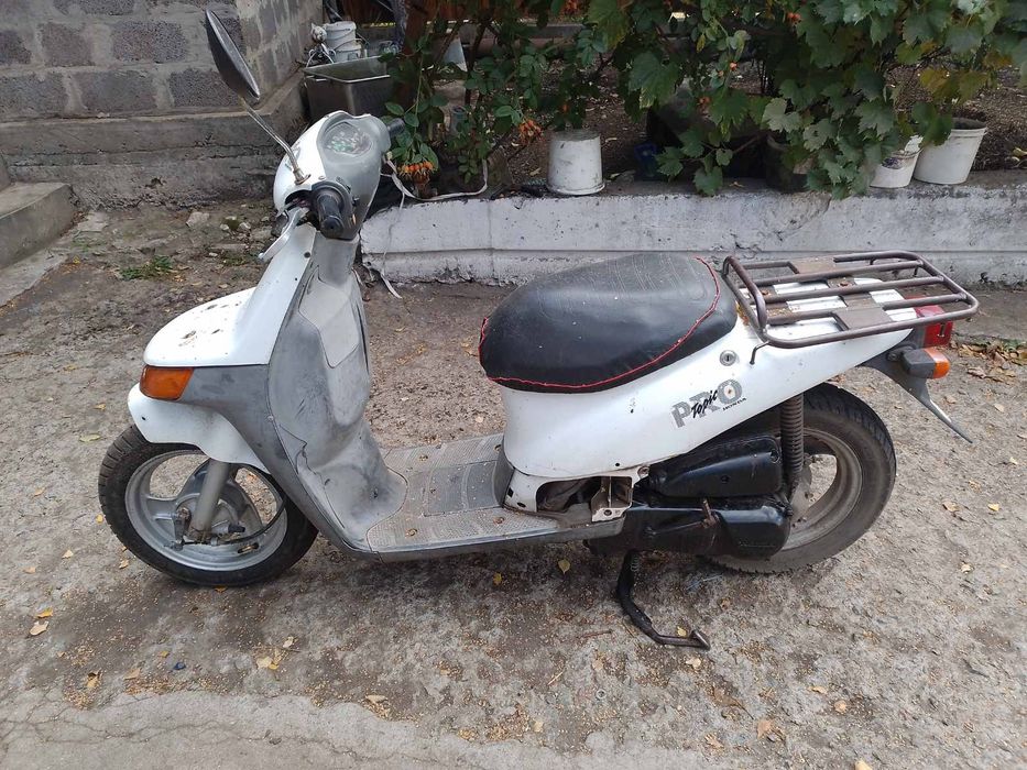 Мопед  - Скутер.