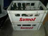 Grades e garrafas antigas de Sumol