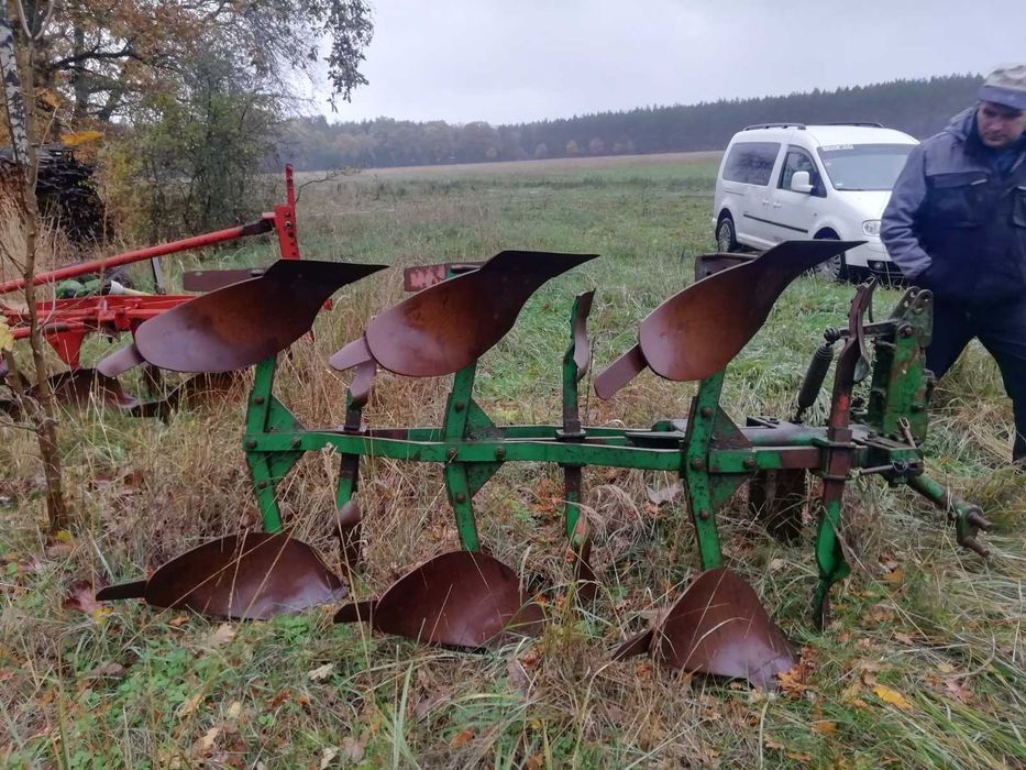 Плуги поворотні трохкорпусні