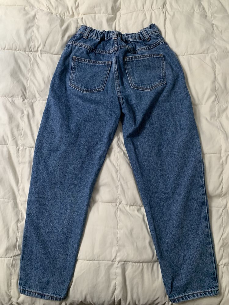 Spodnie jeansowe dla dziewczyny Reserved rozm 152