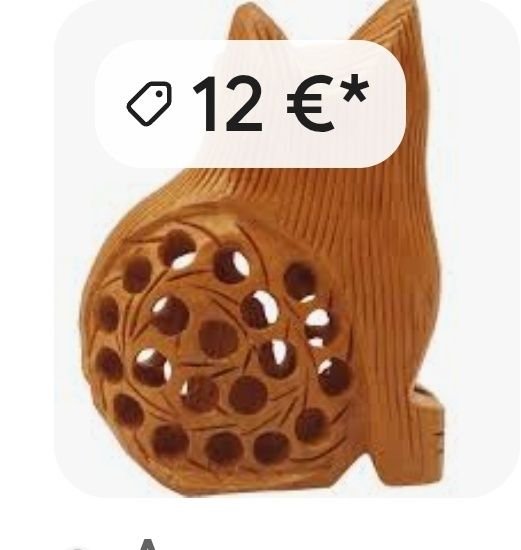 Figurka kota z drewna.