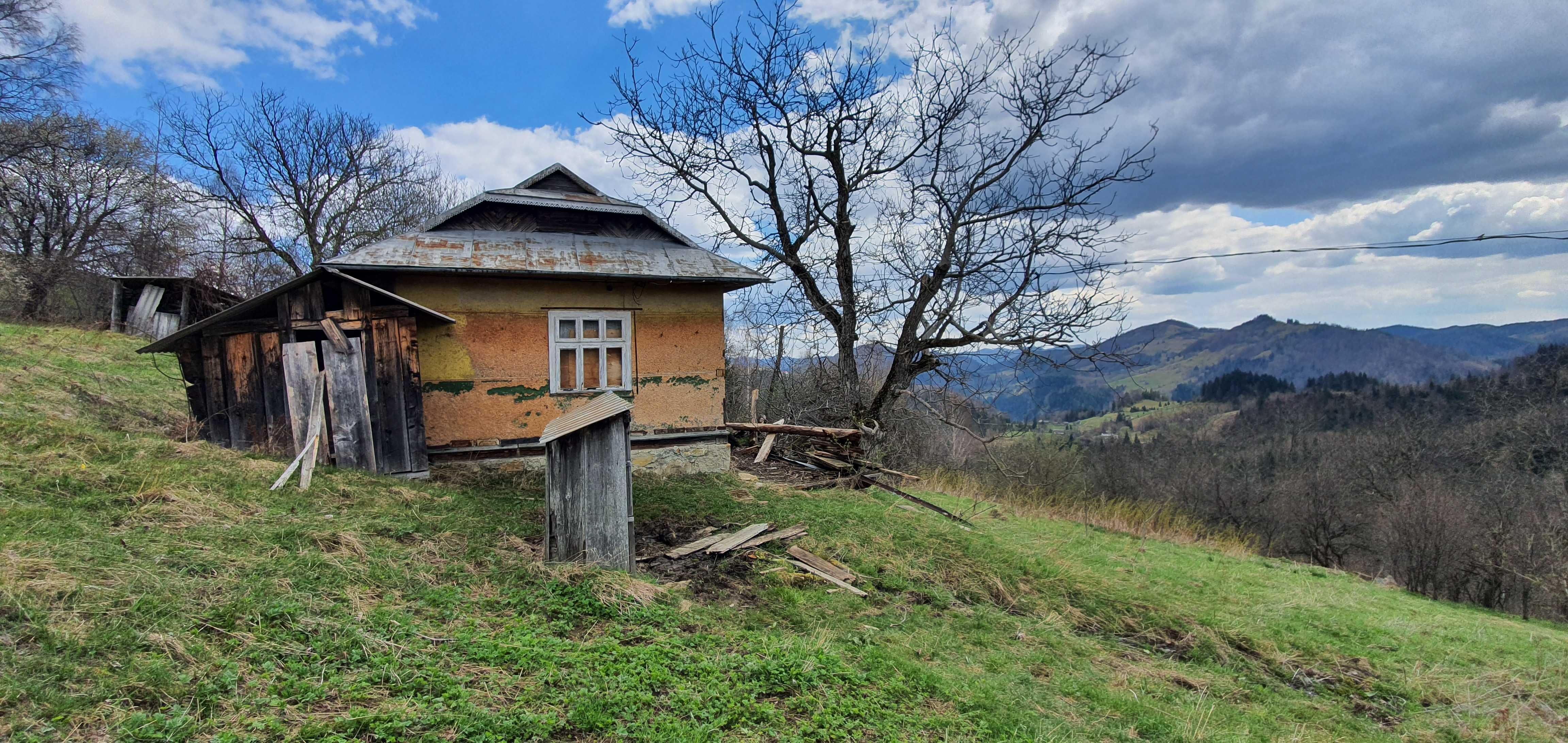 Продам земельну ділянку з будинком