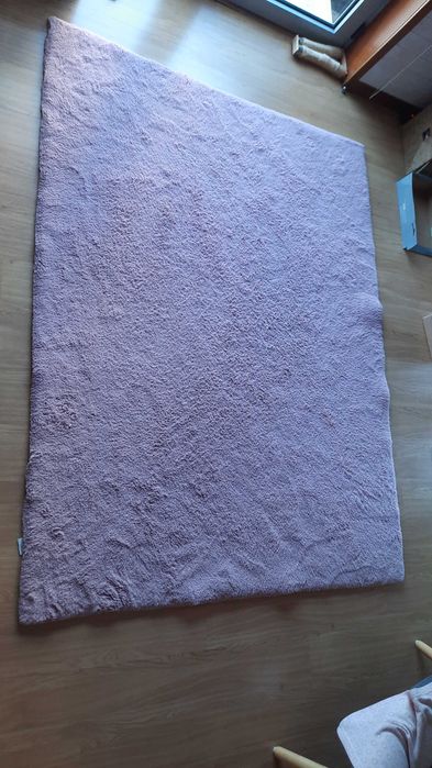 Tapete de sala  rosa claro.