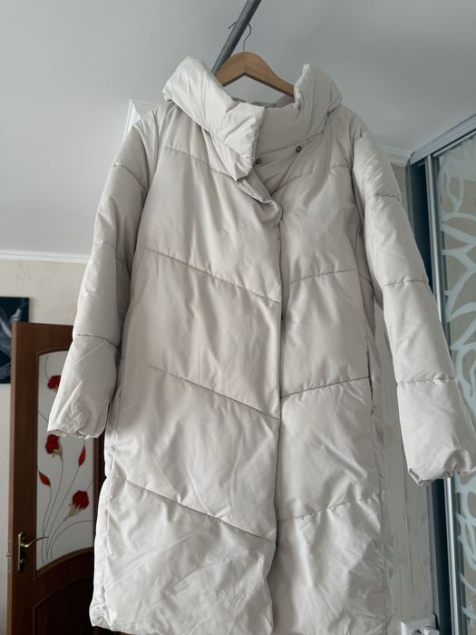 Зимова куртка на закльопках