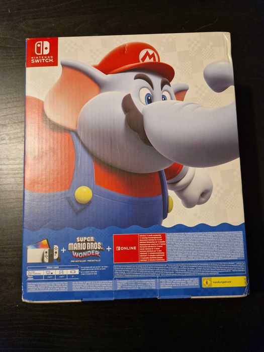 Nintendo Switch Oled + Super Mario Bros. Wonder + 12 meses de Online