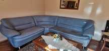 Duża narożna sofa  w komplecie z podnóżkiem