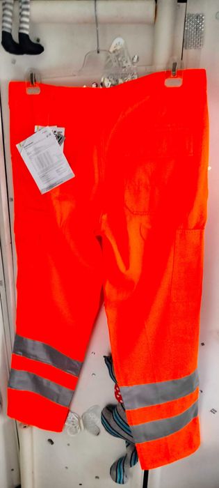 Nowe spodnie robocze ochronne ostrzegawcze pomarańczowe Planam