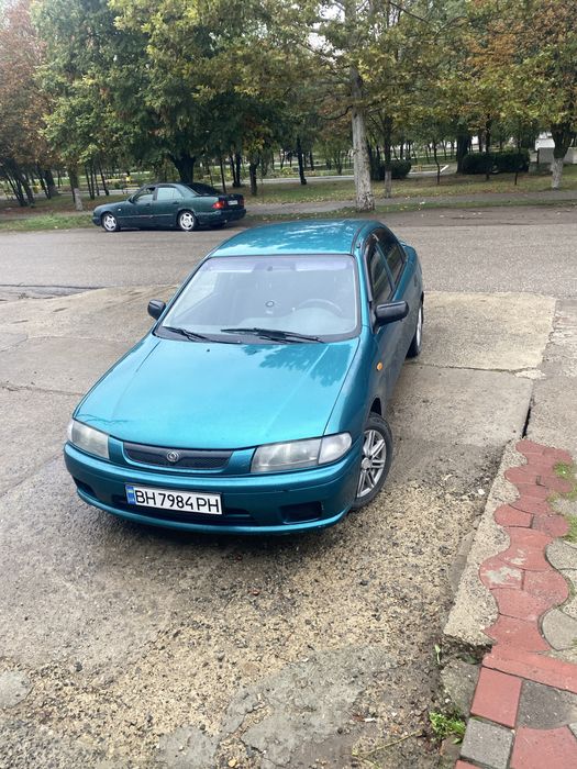 Мазда 323/ 1.5/акпп/1998