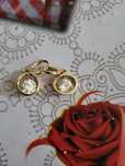 Brincos em ouro com diamante