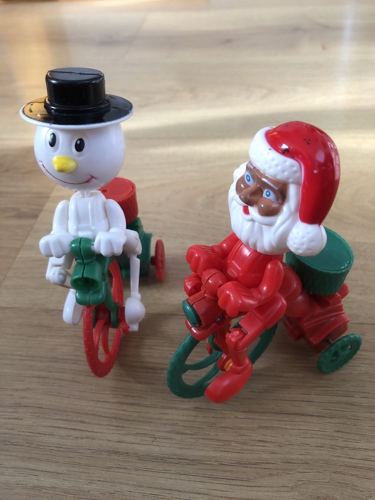Санта/сніговик на велосипеді іграшка заводна