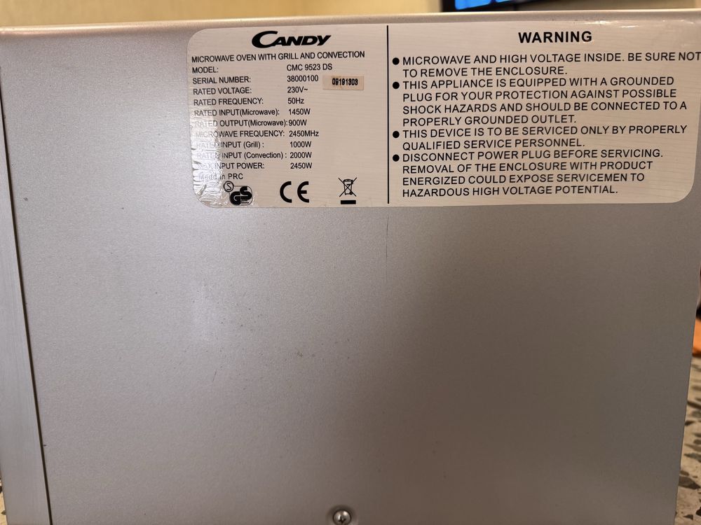 Мікрохвильова піч з конвекцією Candy CMC 9528 DS