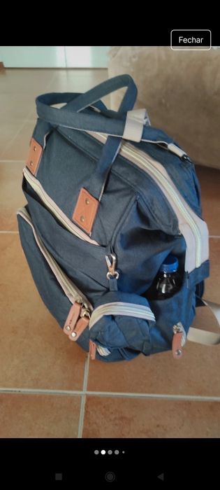 Mochila com berço portátil
