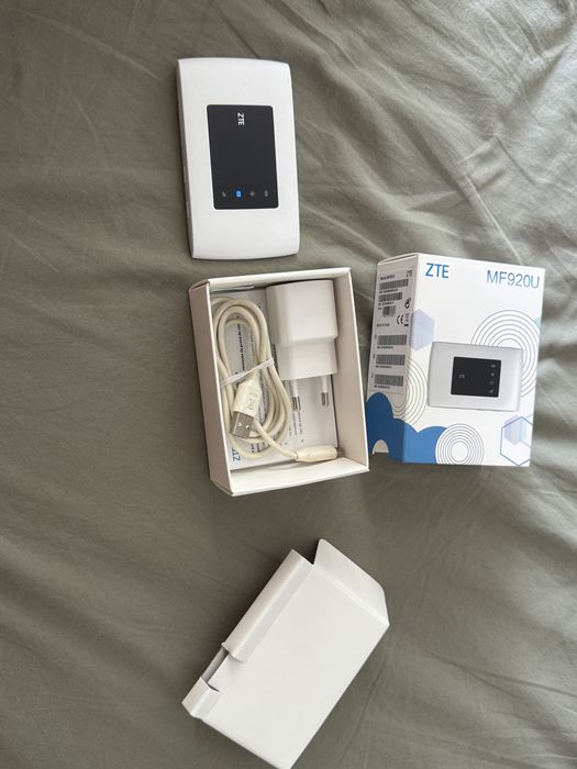 Router portatil com cabo e caixa a 20€