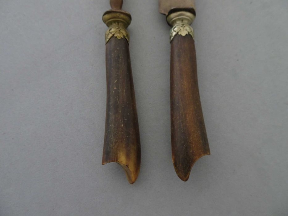 Antigos talheres com incrustações em prata e osso