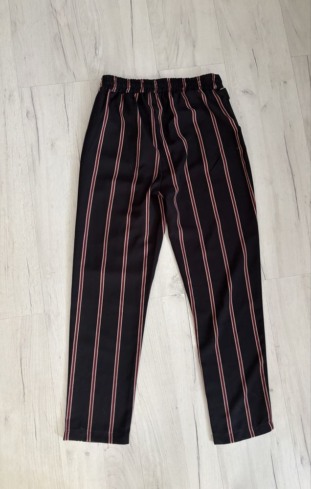 Reserved spodnie damskie w paski luźne eleganckie wyski stan
