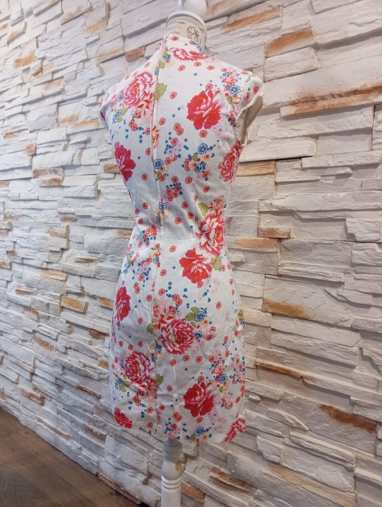 Różowa, orientalna sukienka midi w kwiaty H&M r.34.      W.B.M.