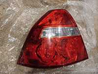 Pęknięta lampa lewa tylna Chevrolet Aveo T250 sedan
