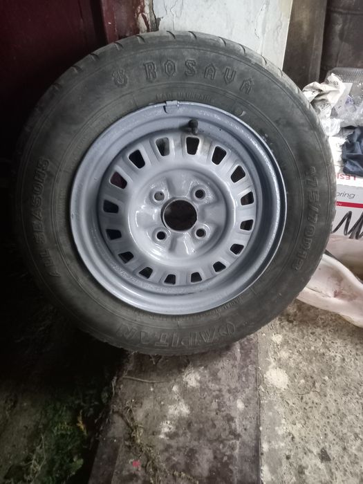 Резина з диском , розболтовка 4 на 100