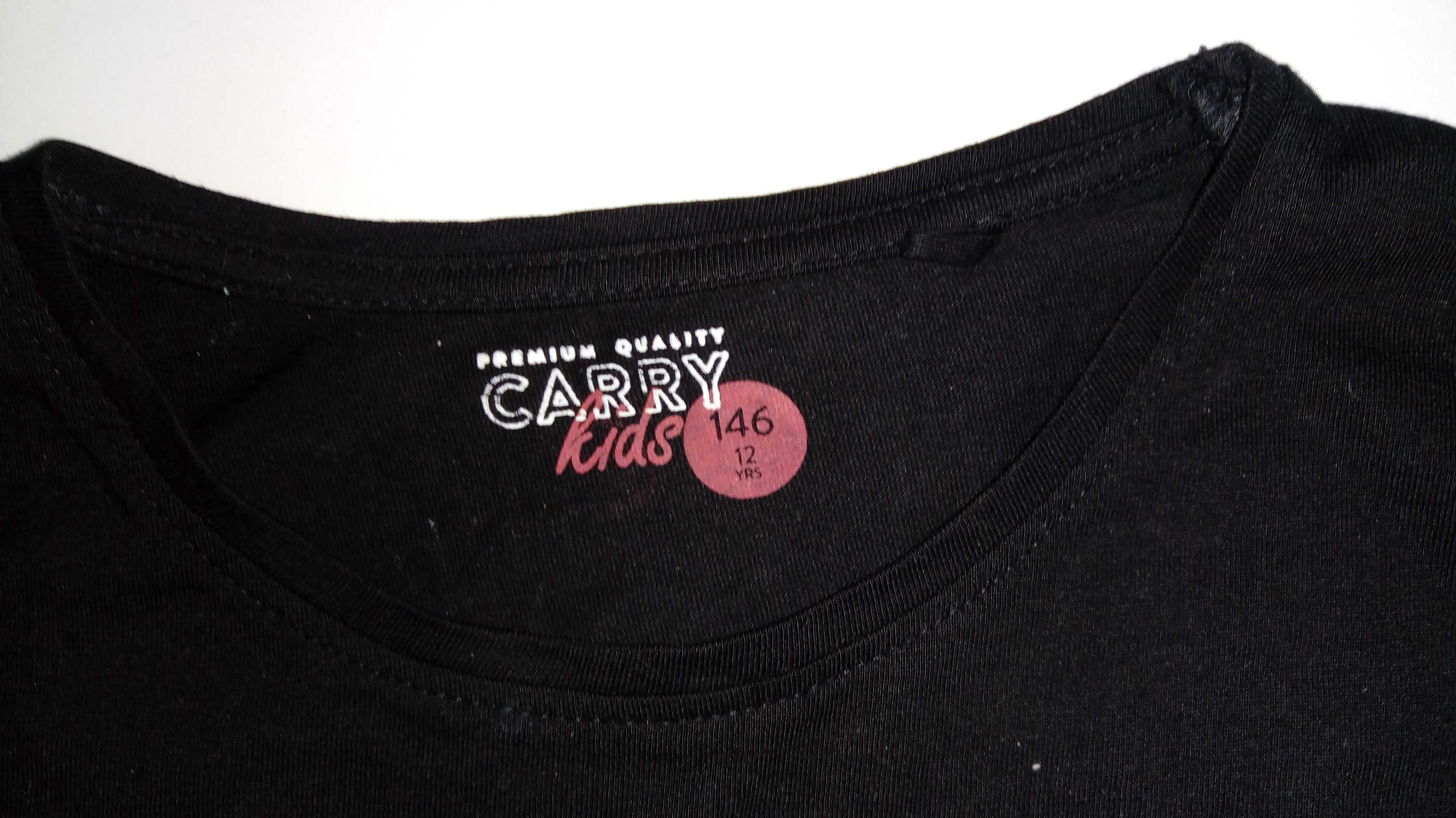 Carry Czarna bluzka długi rękaw zmieniające się cekiny r 146-152cm