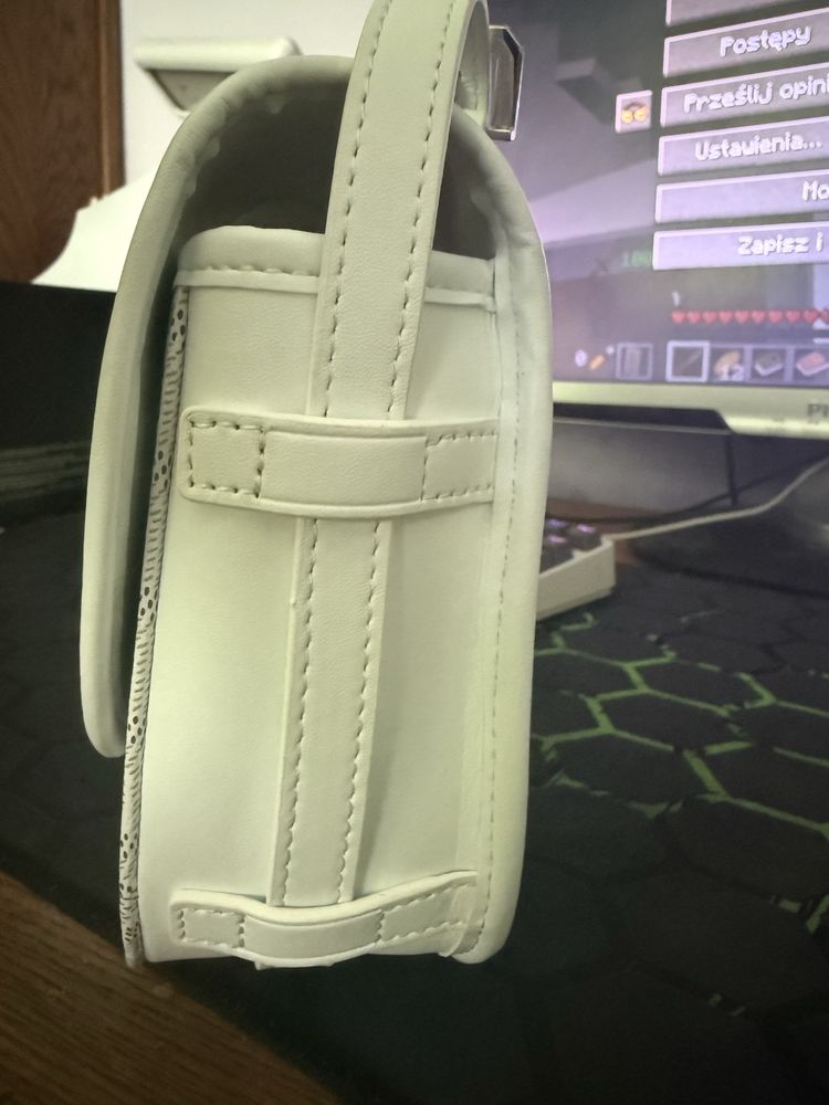 Sprzedam bialą torebke goyard