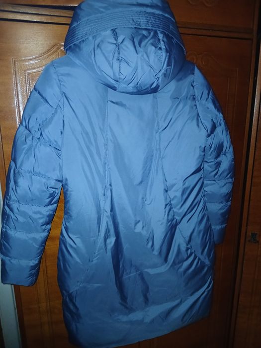 Новый  пуховик отличном состоянии и  качества